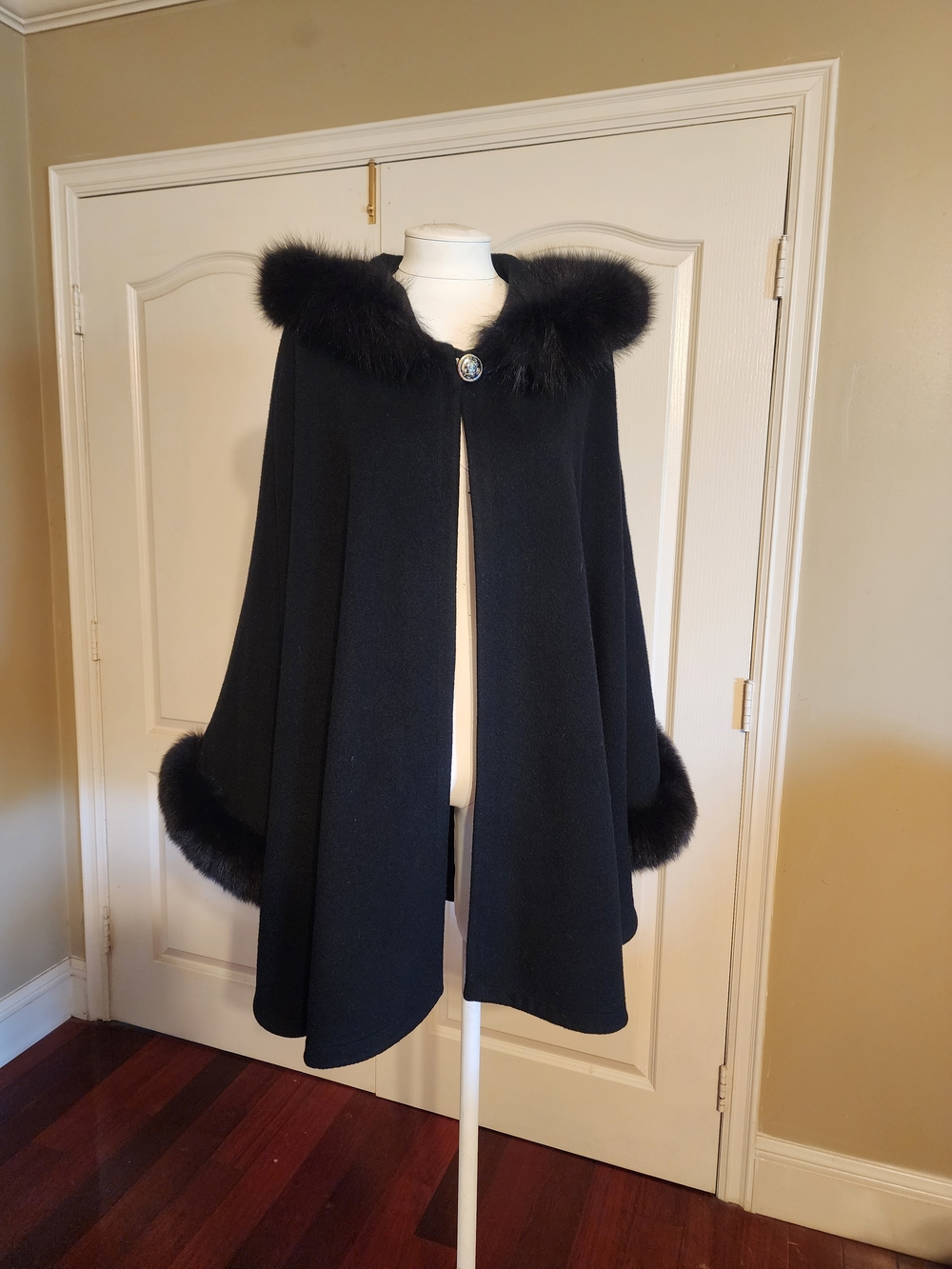 St. John Black Wool Cape with Faux Fur-Trimmed Hood and Cuffs.
